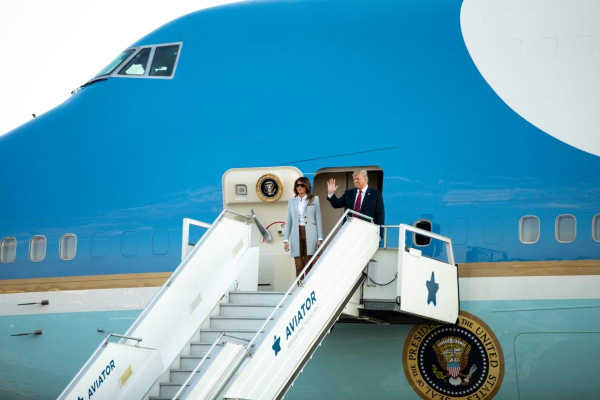 President Donald Trump and First Lady Melania Trump arrive in Helsinki, on July 15, 2018. (Charlotte Cuthbertson/The Epoch Times)