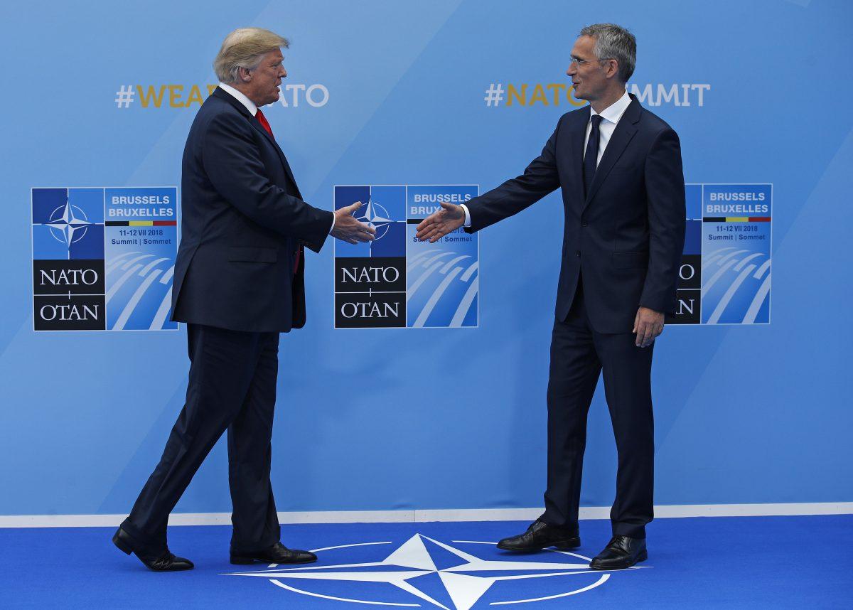 President Donald Trump is welcomed by NATO Secretary General Jens Stoltenberg as he arrives for the NATO summit in Brussels on July 11, 2018. (FRANCOIS MORI/AFP/Getty Images)