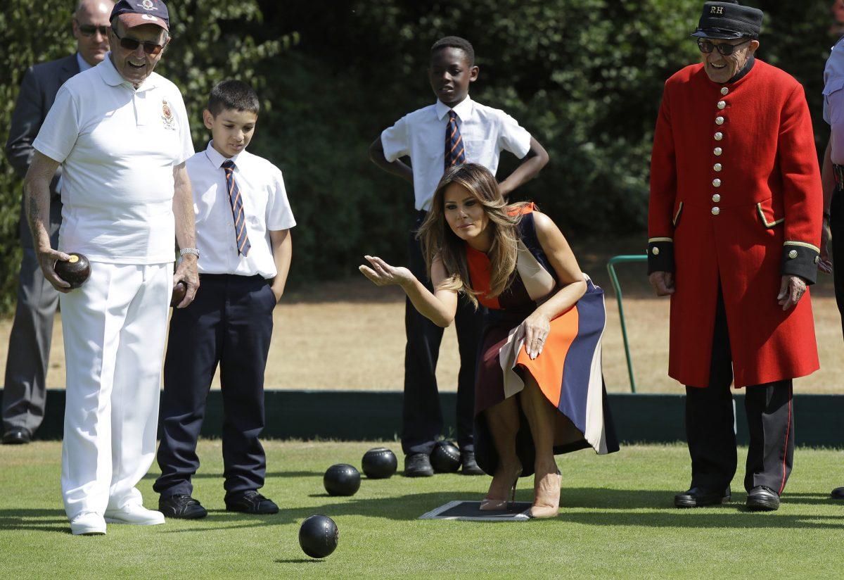 First Lady Melania Trump plays bowls during a visit with British military veterans at Royal Hospital Chelsea in London, on July 13, 2018. (Luca Bruno–WPA Pool/Getty Images)