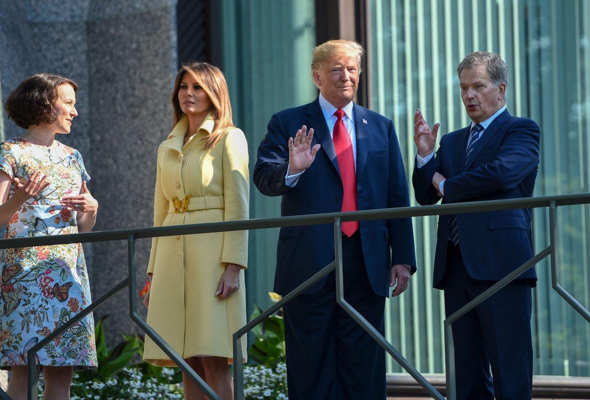 President Donald Trump and First Lady Melania Trump pose with Finnish President Sauli Niinisto and his wife Jenni Haukio at the Presidential Palace in Helsinki, on July 16, 2018, ahead a meeting between Trump and Russian President Vladimir Putin. (BRENDAN SMIALOWSKI/AFP/Getty Images)