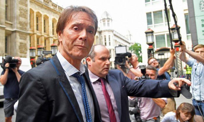 Singer Cliff Richard arrives at the High Court for judgement in the privacy case he brought against the BBC, in central London, Britain, July 18, 2018. (Toby Melville/Reuters)