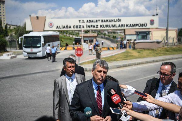 US chargé d'affaires Philip Kosnett (C) speaks to media members after the trial of US Pastor Andrew Brunson who is detained in Turkey for over a year on Terror charges, in Aliaga, north of Izmir, on July 18, 2018. (Ozan Kose/AFP/Getty Images)