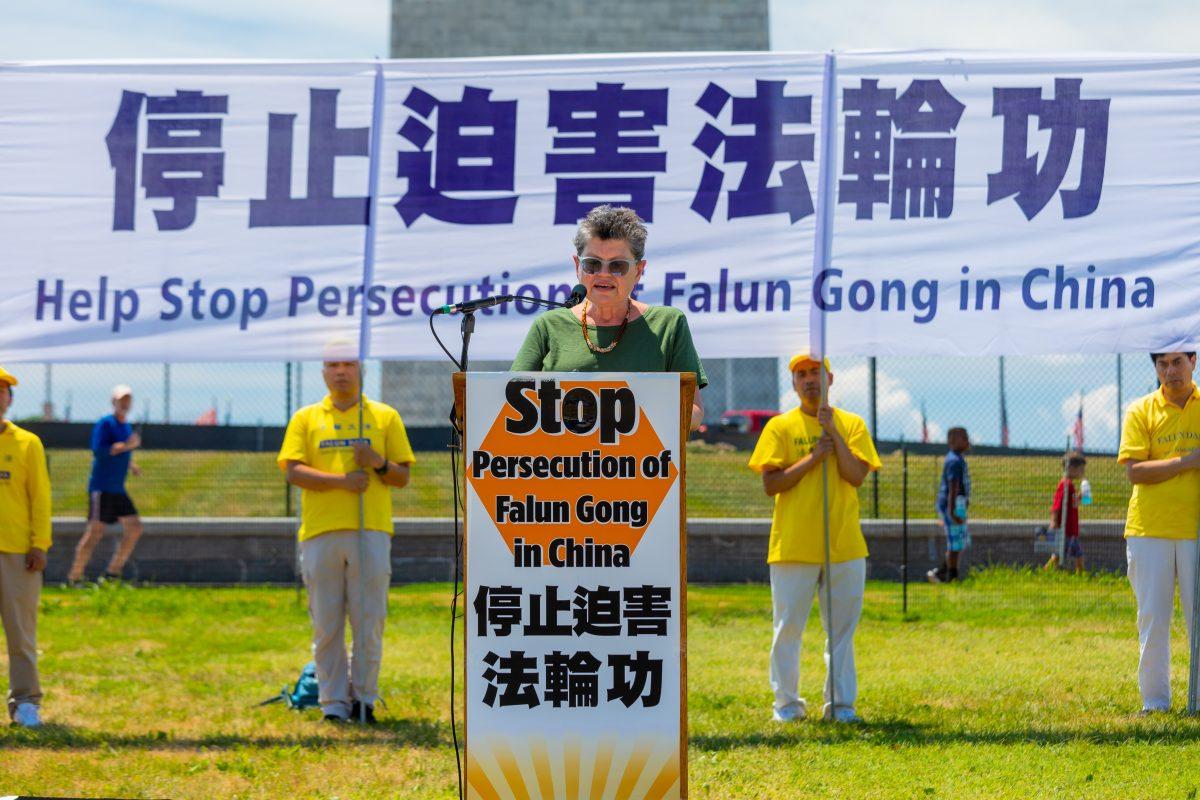 Faith McDonnell, Director for Religious Liberty Programs, Institute on Religion and Democracy, speaking a rally calling for the end of the persecution of Falun Gong, before the Washington Monument on Jully 19, 2018. (Mark Zou/Epoch Times)
