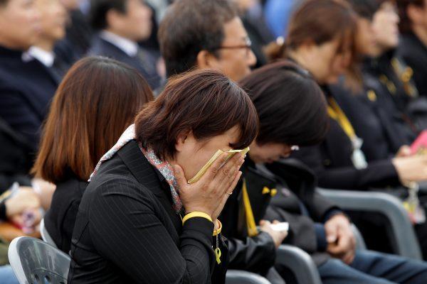 FILE: A mother of a Sewol ferry disaster victim weeps during a 2nd anniversary memorial at group memorial altar for victims of the sunken ferry Sewol at the Hwarang Recreation Park on April 16, 2016 in Ansan, South Korea. (Photo by Chung Sung-Jun/Getty Images)