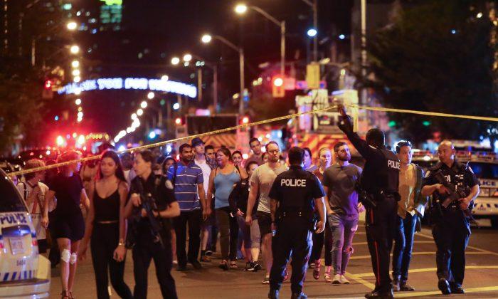 Gunman Kills 2, Injures 12 on Bustling Toronto Avenue, Police Say