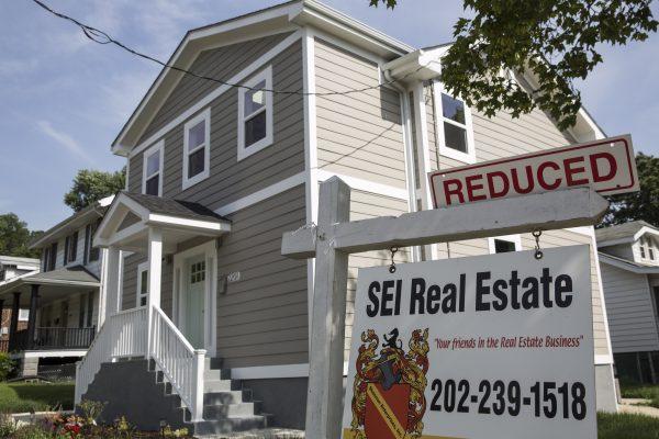 A house for sale in northeast Washington on June 23, 2015. Victims of identity theft are often unable to obtain a mortgage because their credit score is ruined by the person who stole their identity. (Drew Angerer/Getty Images)