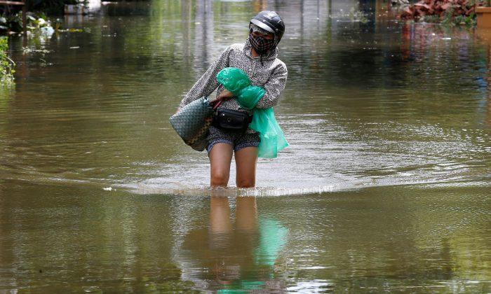 Vietnam Flood Death Toll Rises to 27, More Rain Forecast