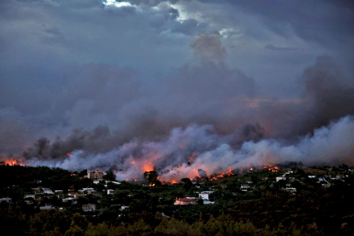 Wildfire Kills at Least 50 Near Athens, Families Flee to Beaches