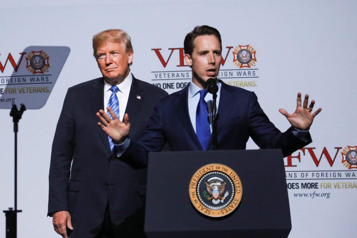 Then-Senate candidate Josh Hawley speaks as President Donald Trump looks on at an event in Kansas City, Mo., on July 24, 2018. (Charlotte Cuthbertson/The Epoch Times)