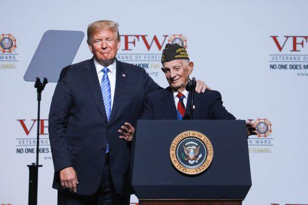 WWII veteran Allen Q. Jones, 94, speaks as President Donald Trump looks on at the 119th annual Veterans of Foreign Wars conference in Kansas City, Mo., on July 24, 2018. (Charlotte Cuthbertson/The Epoch Times)