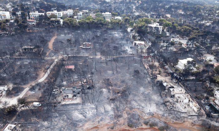 Greeks Seek Answers as Fire Toll Mounts