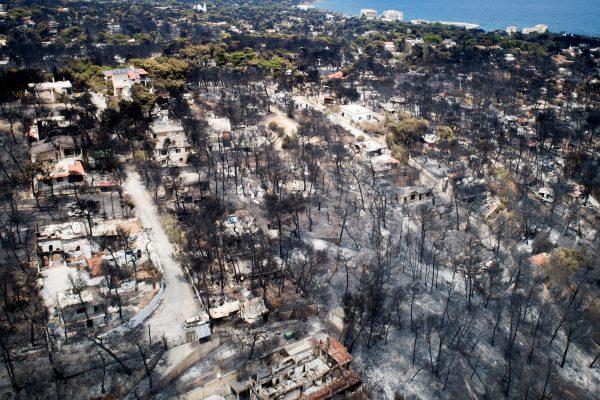An aerial view shows burnt houses and trees following a wildfire in the village of Mati, near Athens, Greece, July 25, 2018. (Antonis Nicolopoulos/Eurokinissi via Reuters)