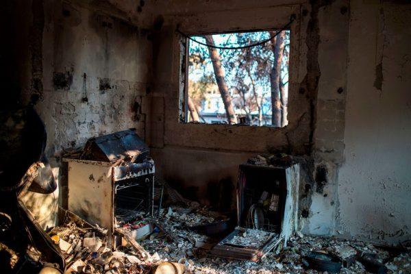 A photo shows the inside of a burnt house following a wildfire in the village of Mati, near Athens, on July 25, 2018. (Angelos Tzortzinis/AFP/Getty Images)