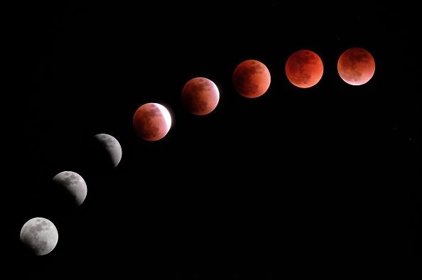 This composite image created on January 31, 2018 shows the moon during a lunar eclipse referred to as the "super blue blood moon" in Tokyo. (Kazuhiro Nogi/AFP/Getty Images)