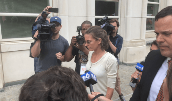 Clare Bronfman leaves Brooklyn federal court in New York on July 25, 2018. The heiress to the Seagram's liquor fortune and three other people were arrested on July 24 for a slew of charges, in relation to NXIVM. (Bowen Xiao/The Epoch Times)