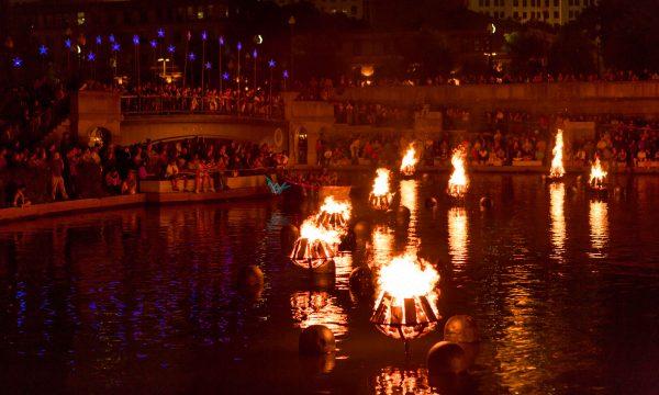 Thousands of spectators crowd the riverwalk for the lighting. (James Turner/Courtesy of WaterFire Providence)