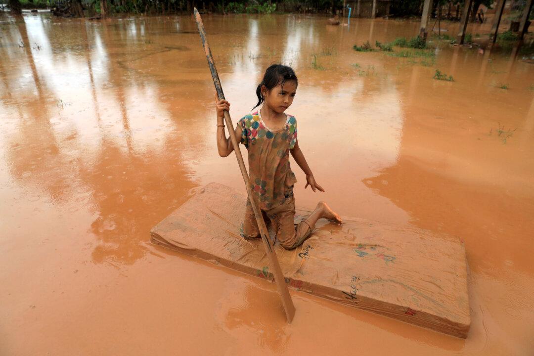 ‘Not Enough Time to Get Out’: Laos Village Caught in Burst Dam Deluge