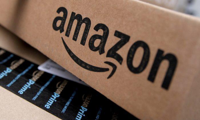 Amazon Shares Hit Record High as Profit Tops $2 Billion for First Time