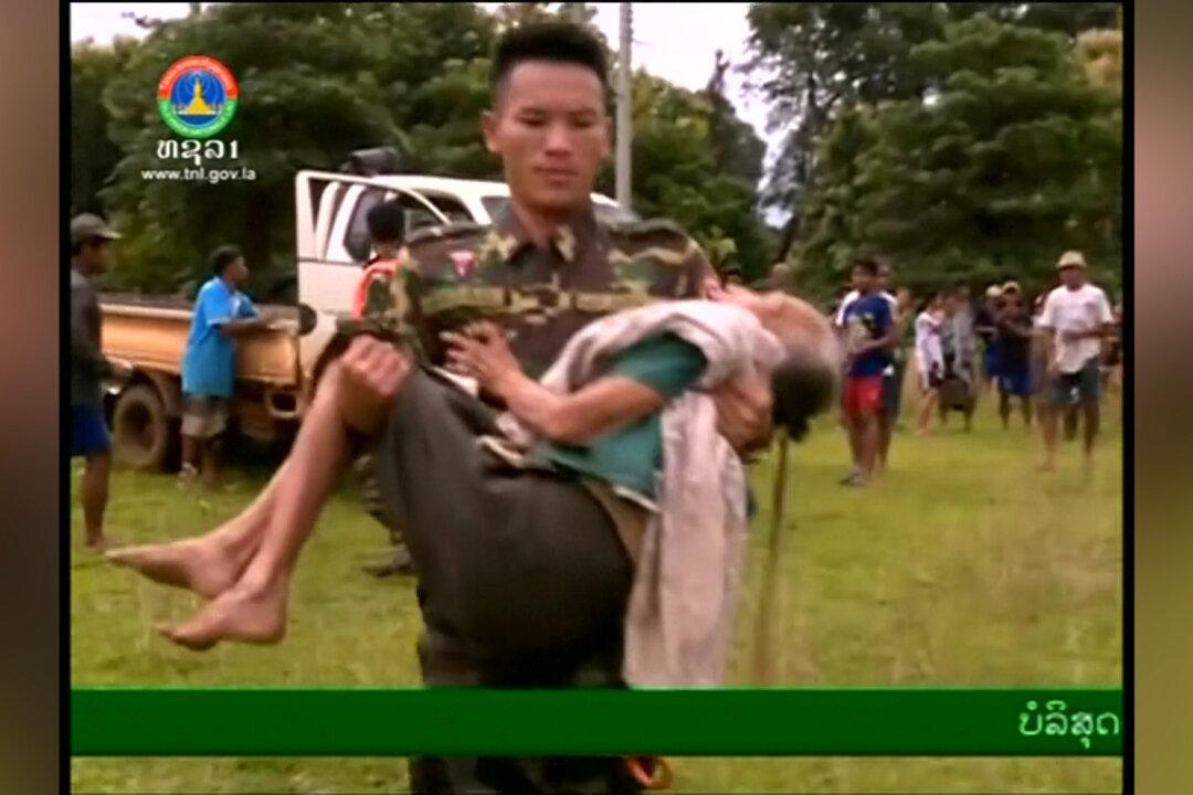 Laos Continues to Evacuate Thousands of Flood Victims to Safety