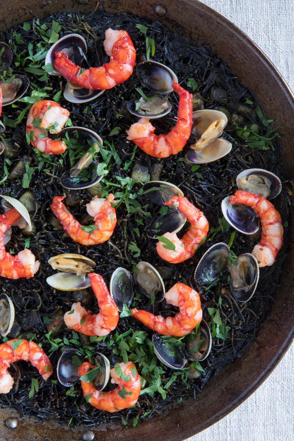 Fideuà Negra: Shrimp, Clams, Cuttlefish, and Fideo Noodles with Squid Ink