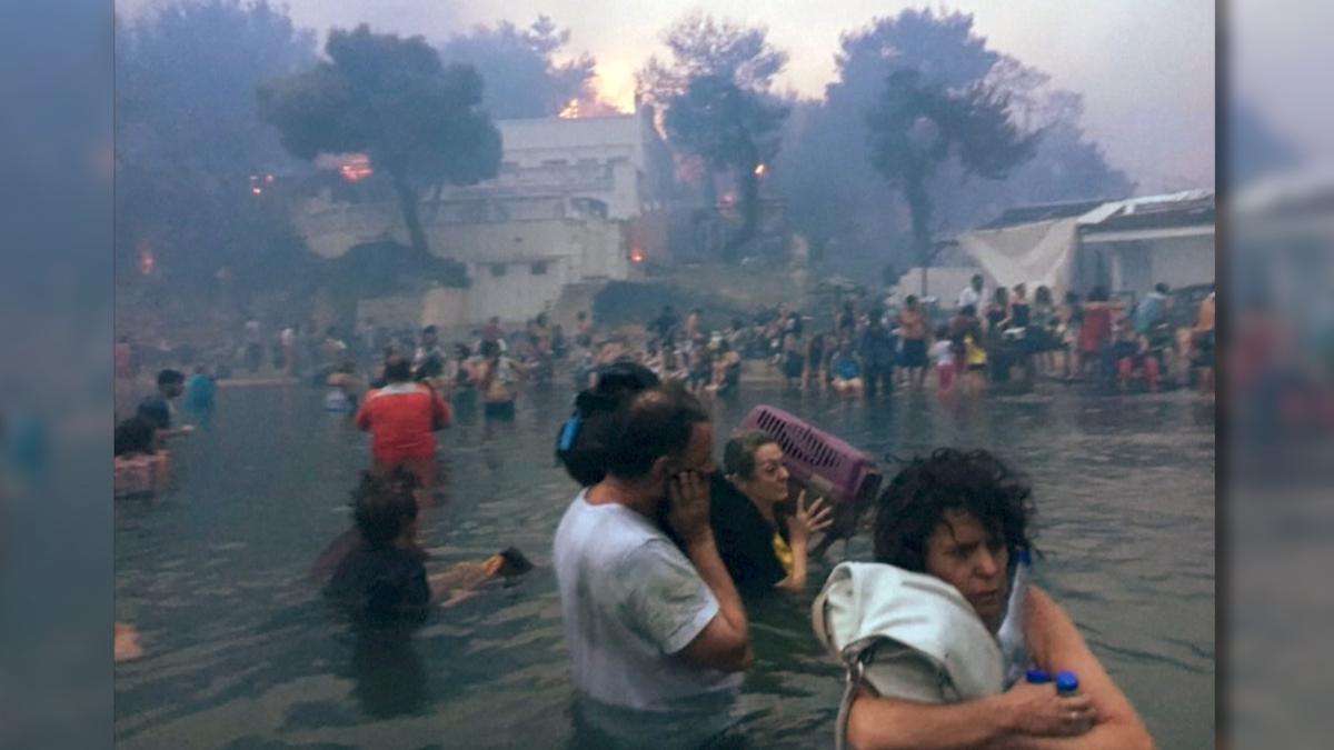 Victims of Greece Wildfires Flee Into Sea to Escape Flames