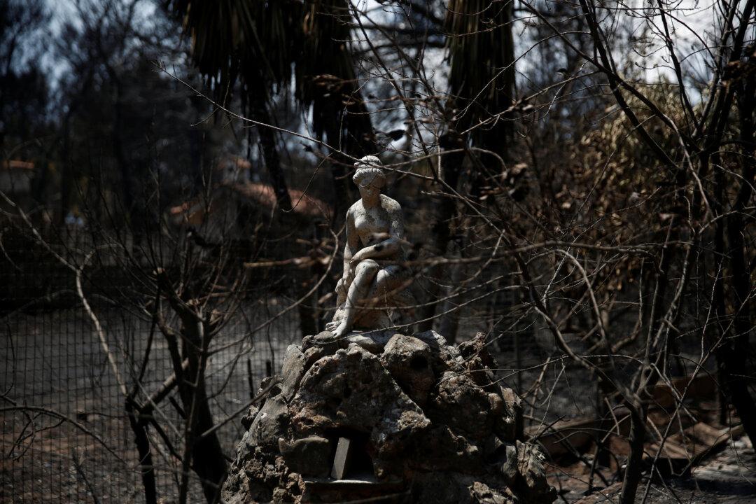 Greek Seaside Town Remembers Lives Lost to Wildfire