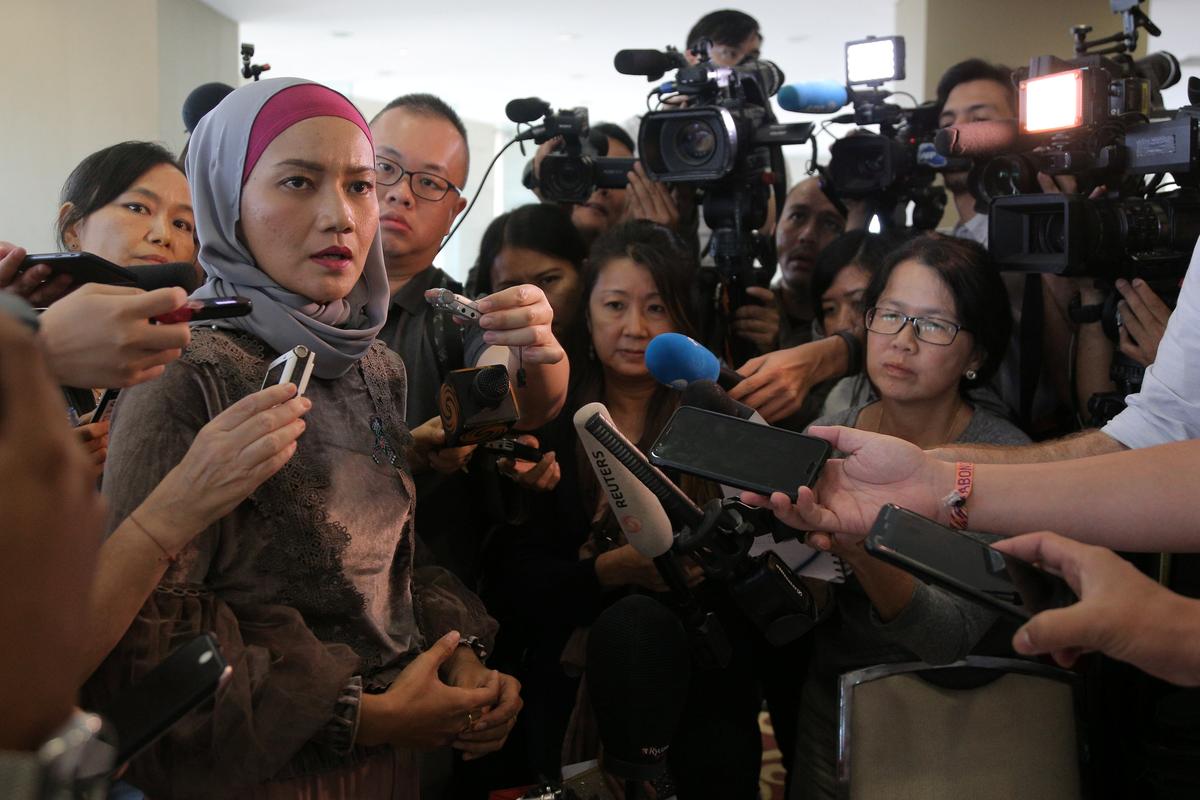 No New Findings in MH370 Probe Report, Families Say