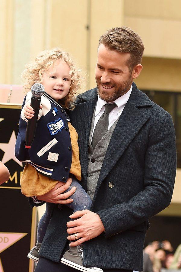 Actor Ryan Reynolds (R) poses for a photo with his daughter James Reynolds during a ceremony honoring him with a star on the Hollywood Walk of Fame on December 15, 2016 in Hollywood, Calif. (Photo by Matt Winkelmeyer/Getty Images)
