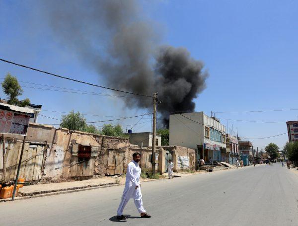 Smoke rises from an area where explosions and gunshots were heard, in Jalalabad city, Afghanistan July 31, 2018. (Reuters/Parwiz)
