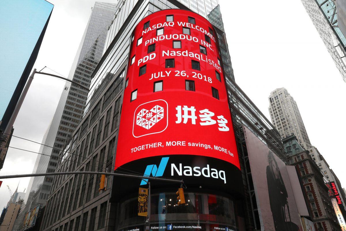 A display at the Nasdaq Market Site shows a message after Chinese e-commerce platform Pinduoduo (PDD) was listed on the Nasdaq exchange in Times Square, New York City, on July 26, 2018. (Mike Segar/Reuters)