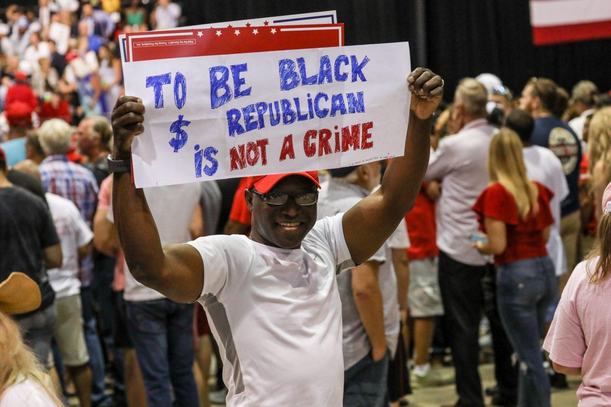 Audience members at President Donald Trump's Make America Great Again rally in Tampa, Fla., on July 31, 2018. (Charlotte Cuthbertson/The Epoch Times)