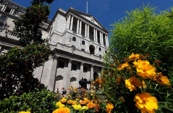 Flowers in bloom are seen opposite the Bank of England, in London, Britain Aug. 1, 2018. (Reuters/Peter Nicholls)