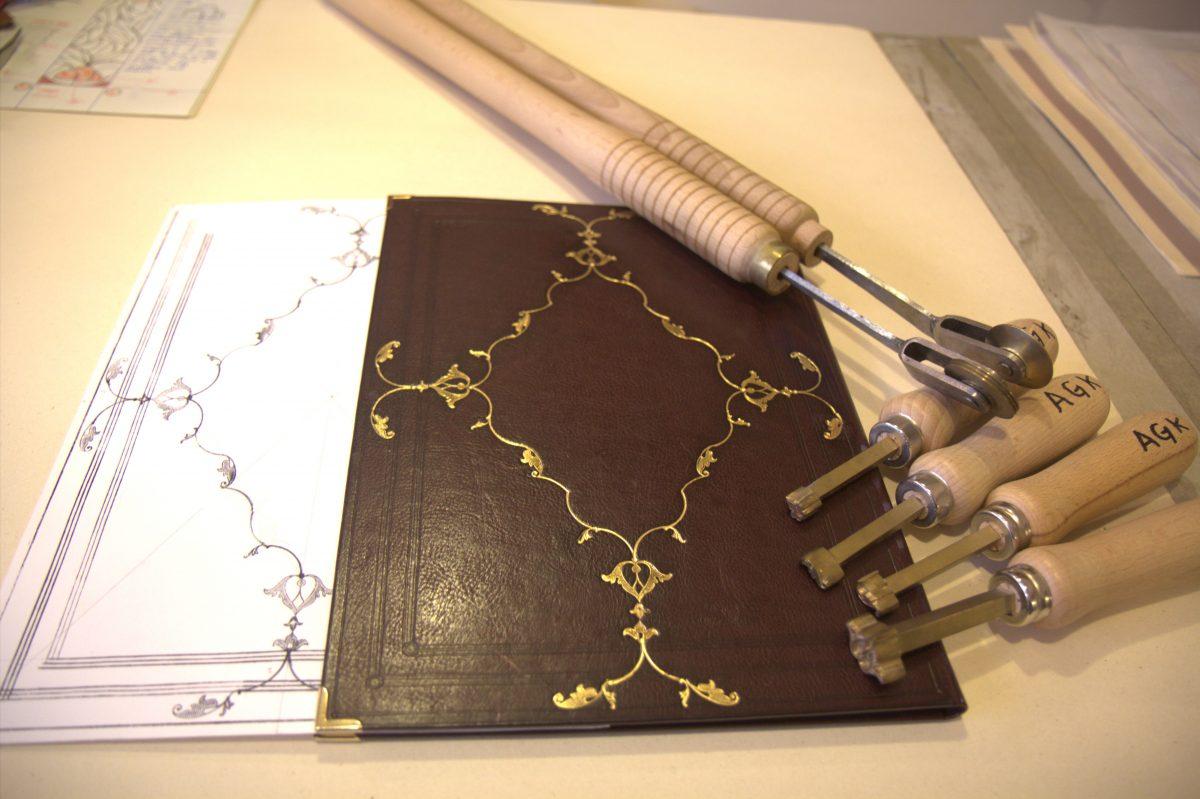 <span style="color: #000000">From start to finish: A Renaissance style design sketch and the manual tools used to transfer the design on to the leather. (Lorraine Ferrier/The Epoch Times)</span>