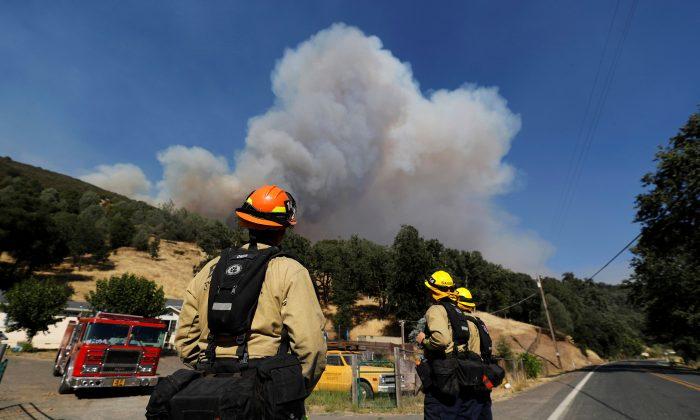 Firefighters Outflank California Blaze, Last Four Missing Found Alive