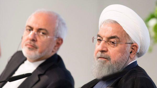 Iranian President Hassan Rouhani (R) and Mohammad Javad Zarif, Iran's Foreign Minister, (L) at the Austrian Chamber of Commerce in Vienna, Austria on July 4, 2018. (Michael Gruber/Getty Images)