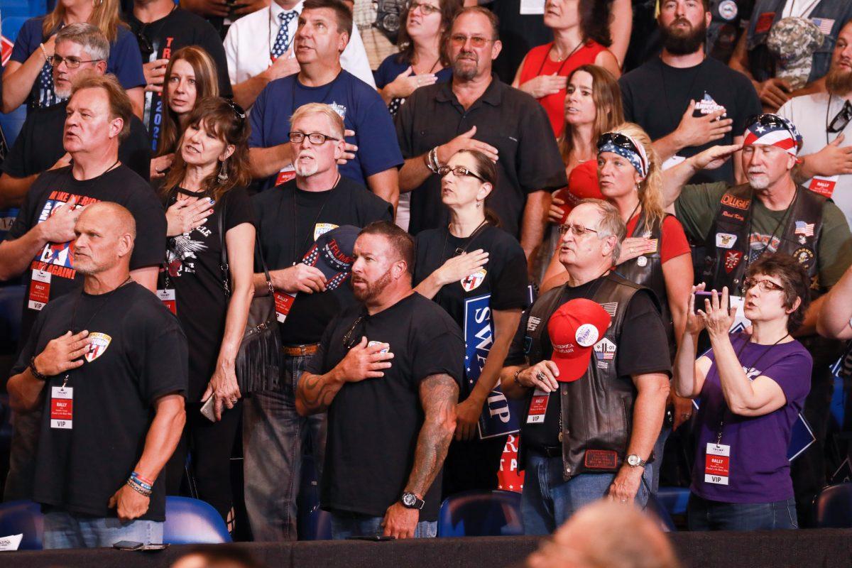 Audience members recite the Pledge of Allegiance at President Donald Trump’s Make America Great Again rally in Wilkes-Barre, Penn., on Aug. 2, 2018. (Samira Bouaou/The Epoch Times)