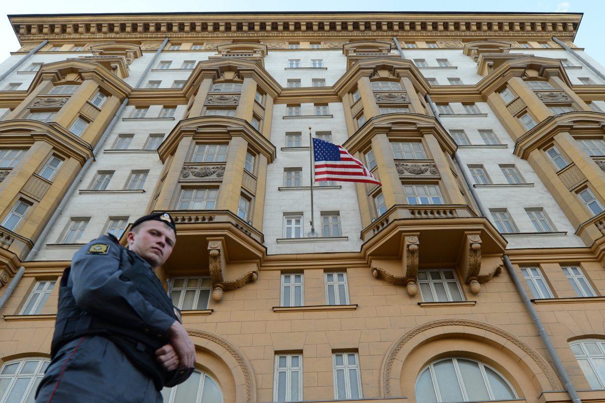 A Russian police officer patrols a street in front of the U.S. Embassy in Moscow in a file photo. (Kirill Kudryavtsev/AFP/GettyImages)