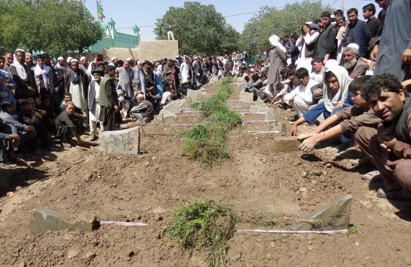 Afghans take part in a burial ceremony for the victims of a suicide bombing attack that took place in a Shi'ite mosque in Gardez, Paktia province, Afghanistan August 4, 2018. (REUTERS/Stringer)