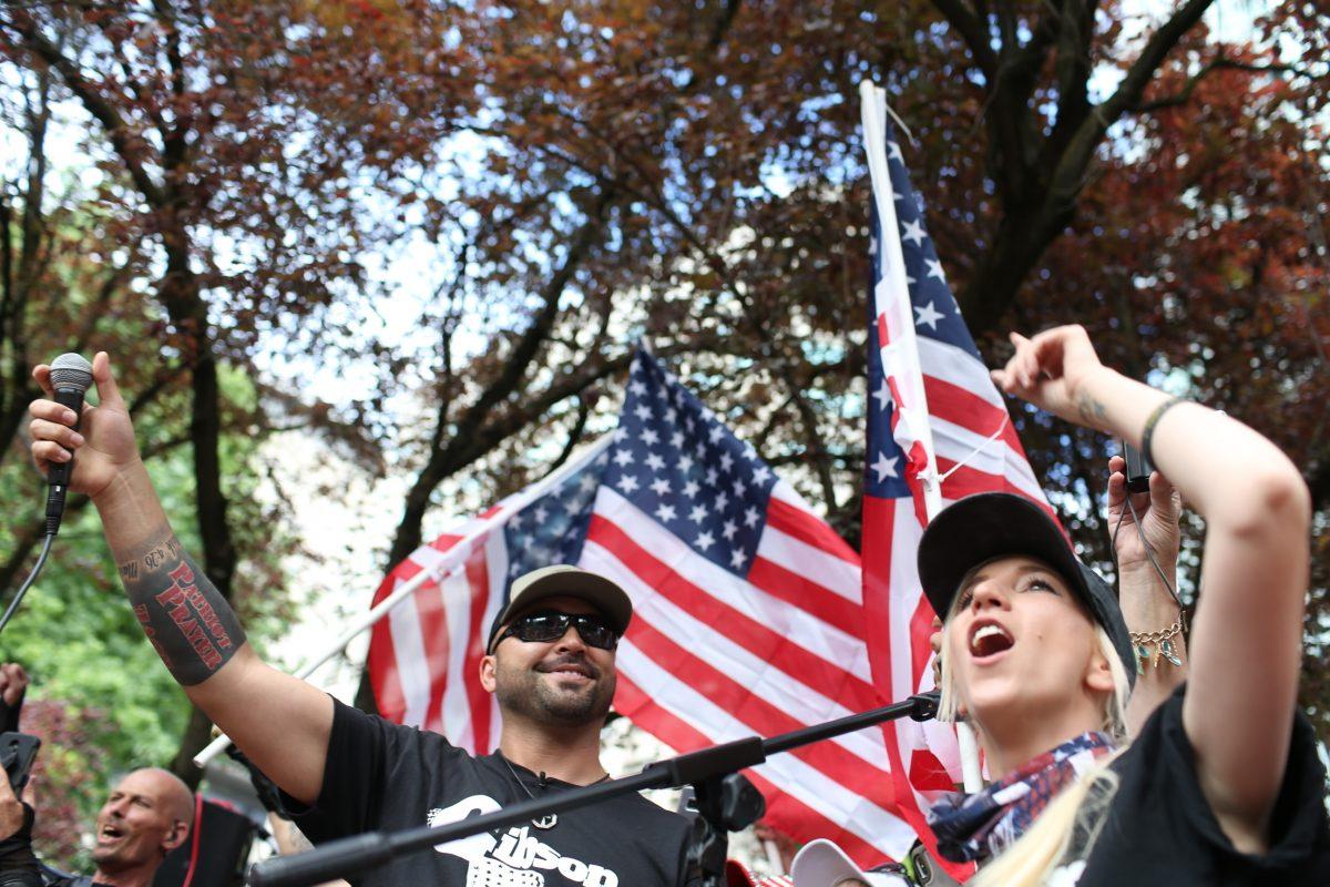 Joey Gibson (C) leader of Patriot Prayer, heads the group's rally in Portland, Ore., on June 30, 2018. (Mark Graves/The Oregonian via AP, file)