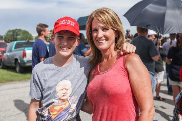 Hayden and Nena Chancy wait in line to attend President Donald Trump's Make America Great Again rally in Tampa, Fla., on July 31, 2018. (Charlotte Cuthbertson/The Epoch Times)