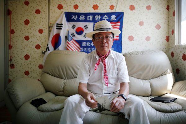 Vietnam War veteran Chung Seung-jin poses for photographs after an interview with Reuters at his home in Suwon, South Korea, July 31, 2018. (Reuters/Kim Hong-Ji)