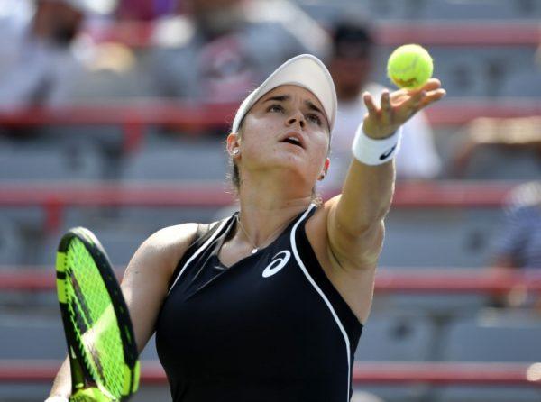 Aug 6, 2018; Montreal, Quebec, Canada; Caroline Dolehide of the United States serves against Venus Williams of the United States (not pictured) in the Rogers Cup tennis tournament. (Eric Bolte—USA TODAY Sports)