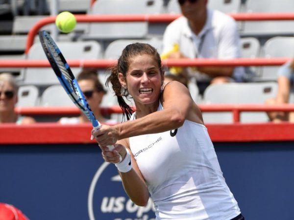 Aug 6, 2018; Montreal, Quebec, Canada; Julia Goerges of Germany hits a backhand against Timea Babos of Hungary (not pictured) in the Rogers Cup tennis tournament. (Eric Bolte—USA TODAY Sports)