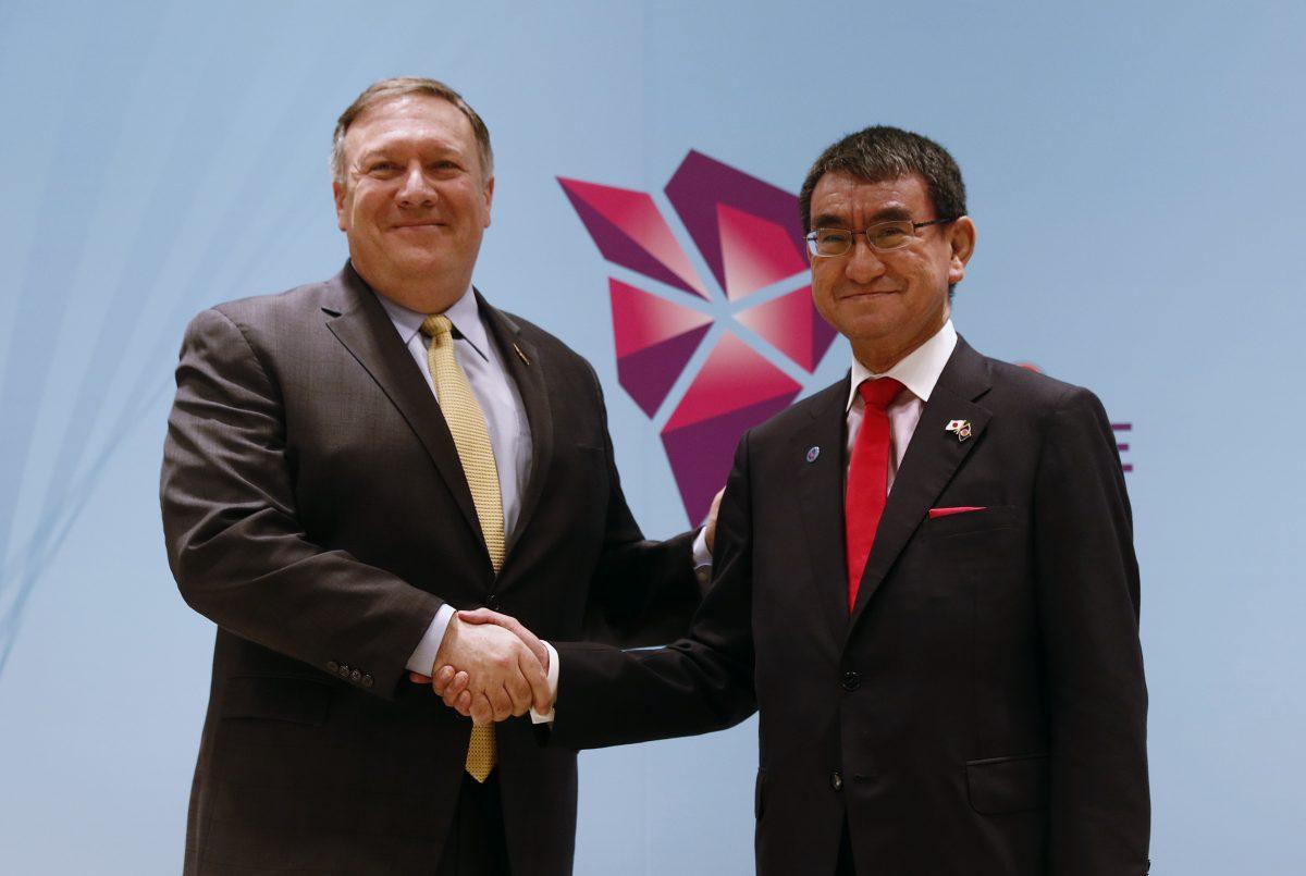 Secretary of State Mike Pompeo (L) shakes hands with Japan's Foreign Minister Taro Kono during a bilateral meeting on the sidelines of the 51st Association of Southeast Asian Nations (ASEAN) Ministerial Meeting (AMM) in Singapore on August 4, 2018. Japan will be an essential part of the U.S. Indo-Pacific strategy. (EDGAR SU/AFP/Getty Images)