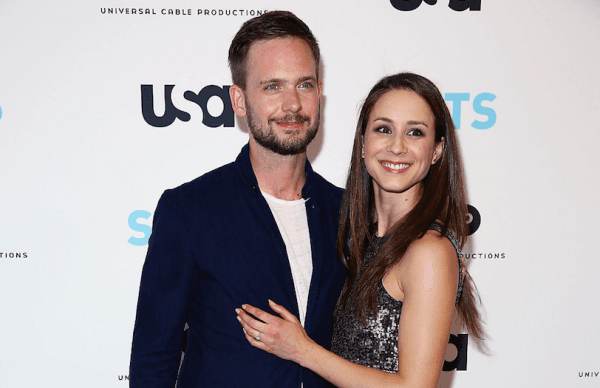 Troian Bellisario & Patrick J. Adams attended the Patrick J. Adams Exhibition Opening of 'SUITS' Gallery in 2015.(Astrid Stawiarz/Getty Images)