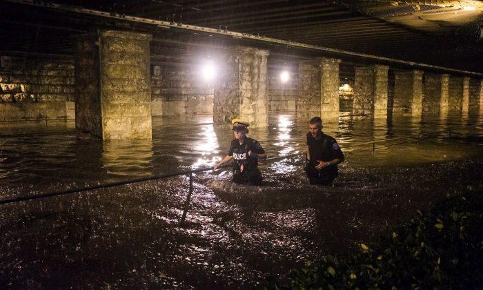 Men Rescued From Flooded Basement Elevator in Toronto
