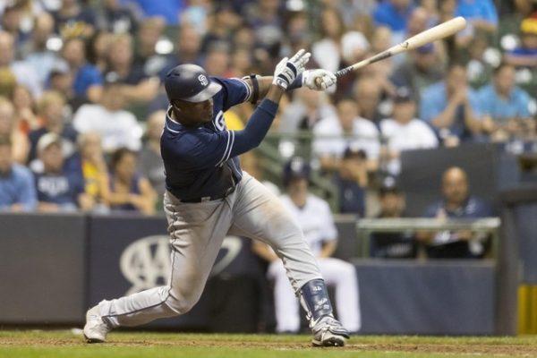 Aug 7, 2018; Milwaukee, WI; San Diego Padres right fielder Franmil Reyes hits an two run double during the seventh inning against the Milwaukee Brewers. (Jeff Hanisch-USA TODAY Sports)