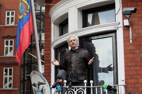Julian Assange speaks to the media from the balcony of the embassy of Ecuador in London on May 19, 2017. (Jack Taylor/Getty Images)