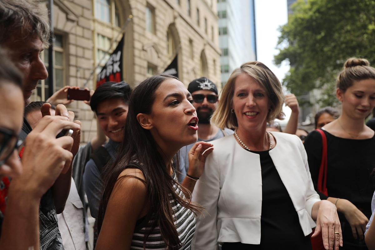 Congressional nominee Alexandria Ocasio-Cortez (L) stands with Zephyr Teachout after endorsing her for New York City Public Advocate on July 12, 2018 in New York City. (Spencer Platt/Getty Images)