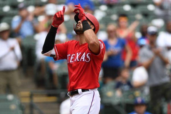Aug. 8, 2018; Arlington, TX; Texas Rangers third baseman Joey Gallo crosses home plate after hitting a home run during the third inning against the Seattle Mariners. (Shanna Lockwood—USA TODAY Sports)